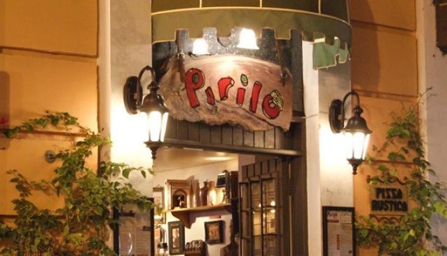 Pirilo Pizza Rustica Isla Verde Beach Sign